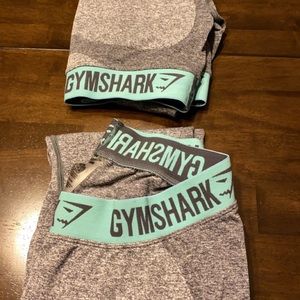 Gymshark 2-piece matching outfit. Gently used. Gray and sky blue color. Size L.